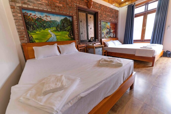 Imagen de la habitación del Hotel Phong Nha Hillside View Bungalow. Foto 33