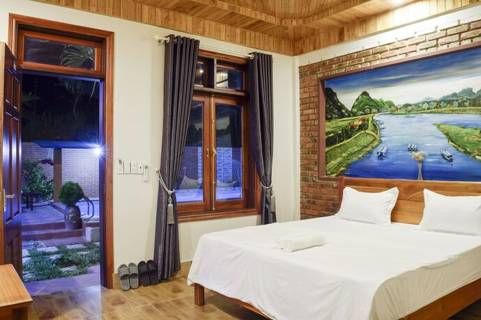 Imagen de la habitación del Hotel Phong Nha Hillside View Bungalow. Foto 36