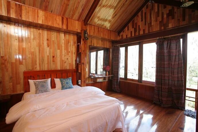 Imagen de la habitación del Hotel Phong Nha Mountain House. Foto 34