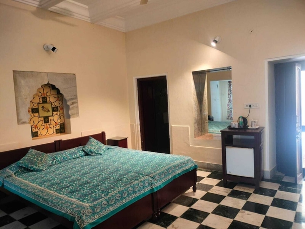 Imagen de la habitación del Hotel Phool Mahal Palace. Foto 8