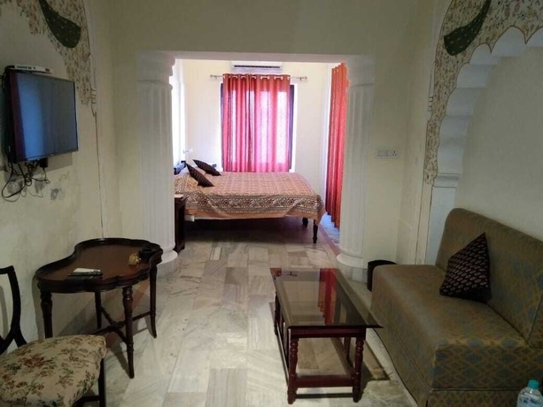 Imagen de la habitación del Hotel Phool Mahal Palace. Foto 9