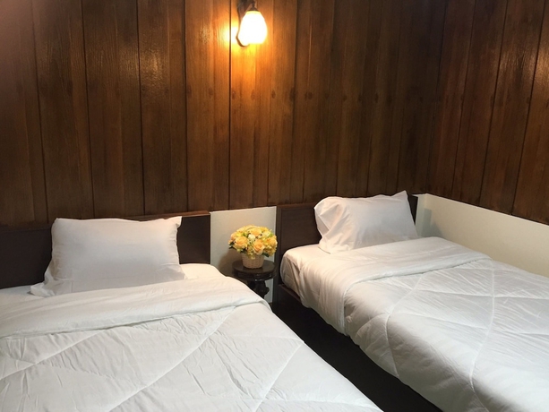 Imagen de la habitación del Hotel Phrasing Guesthouse. Foto 8