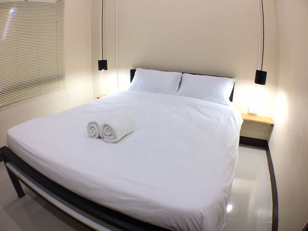 Imagen de la habitación del Hotel Phrasing Guesthouse. Foto 11