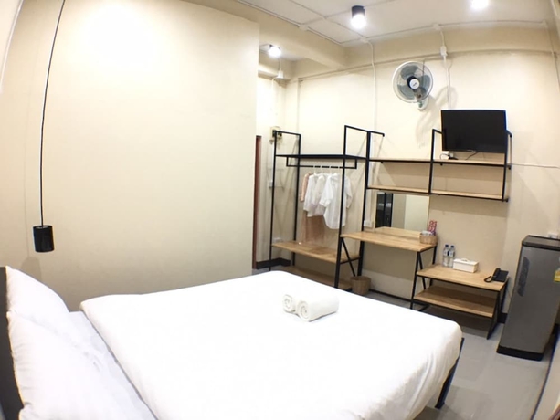 Imagen de la habitación del Hotel Phrasing Guesthouse. Foto 18