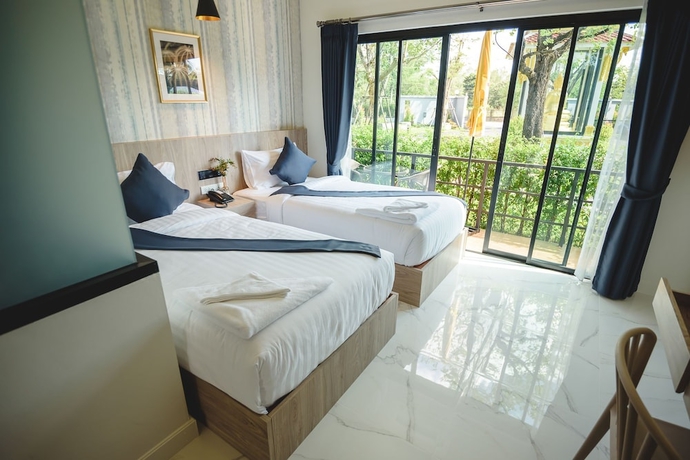 Imagen de la habitación del Hotel Phuengluang Riverside Hotel Chanthaburi. Foto 2