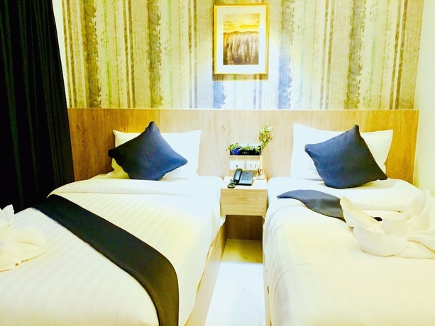 Imagen de la habitación del Hotel Phuengluang Riverside Hotel Chanthaburi. Foto 7