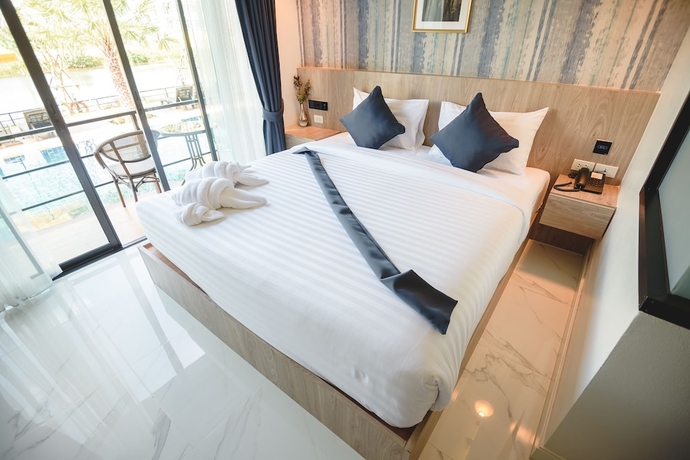 Imagen de la habitación del Hotel Phuengluang Riverside Hotel Chanthaburi. Foto 8