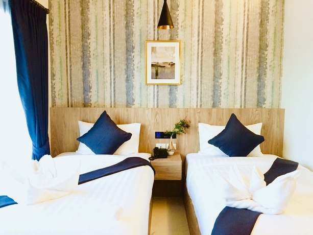 Imagen de la habitación del Hotel Phuengluang Riverside Hotel Chanthaburi. Foto 9