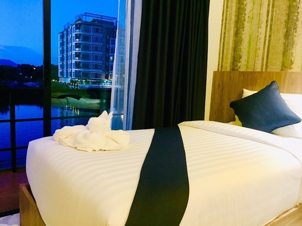 Imagen de la habitación del Hotel Phuengluang Riverside Hotel Chanthaburi. Foto 11