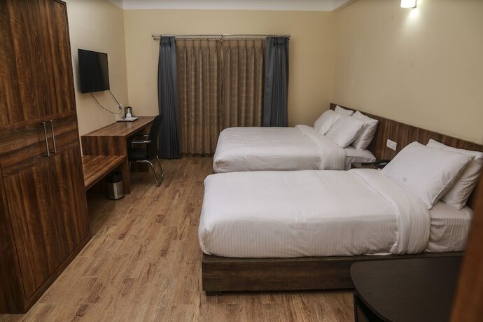 Imagen de la habitación del Hotel Phuentsholing. Foto 15