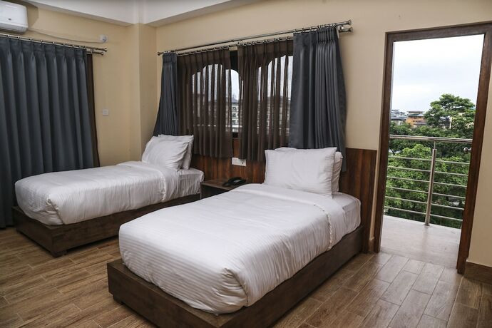 Imagen de la habitación del Hotel Phuentsholing. Foto 16