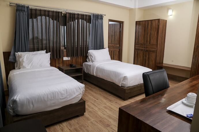 Imagen de la habitación del Hotel Phuentsholing. Foto 17
