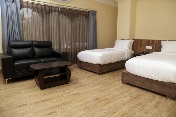 Imagen de la habitación del Hotel Phuentsholing. Foto 18