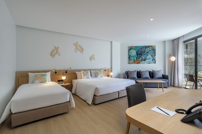 Imagen de la habitación del Hotel Phuket Emerald Beach Resort. Foto 2