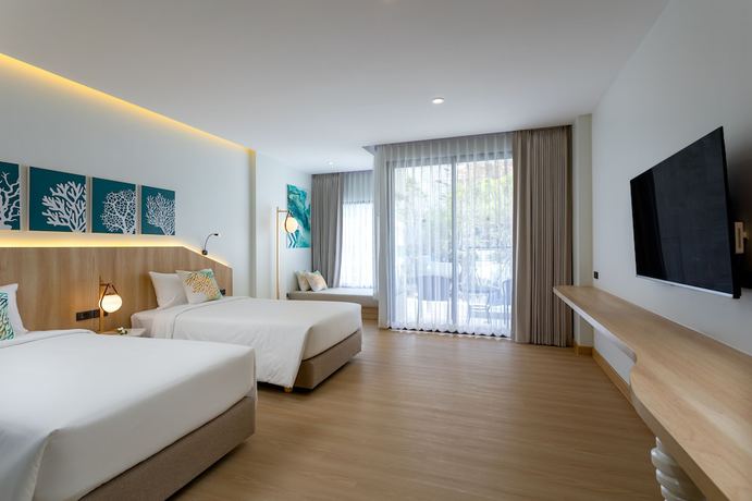 Imagen de la habitación del Hotel Phuket Emerald Beach Resort. Foto 5