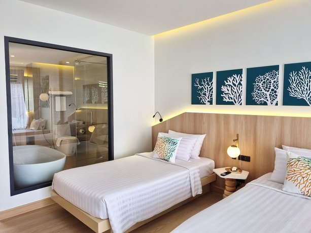 Imagen de la habitación del Hotel Phuket Emerald Beach Resort. Foto 10