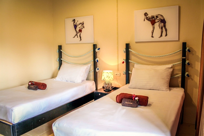 Imagen de la habitación del Hotel Phuket Muay Thai House. Foto 3