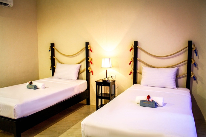 Imagen de la habitación del Hotel Phuket Muay Thai House. Foto 9