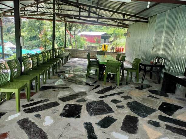 Imagen del bar/restaurante del Hotel Phulwari Resort. Foto 5