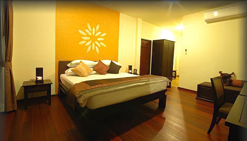Imagen de la habitación del Hotel Phunacome Resort. Foto 5