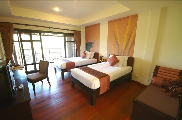 Imagen de la habitación del Hotel Phunacome Resort. Foto 6