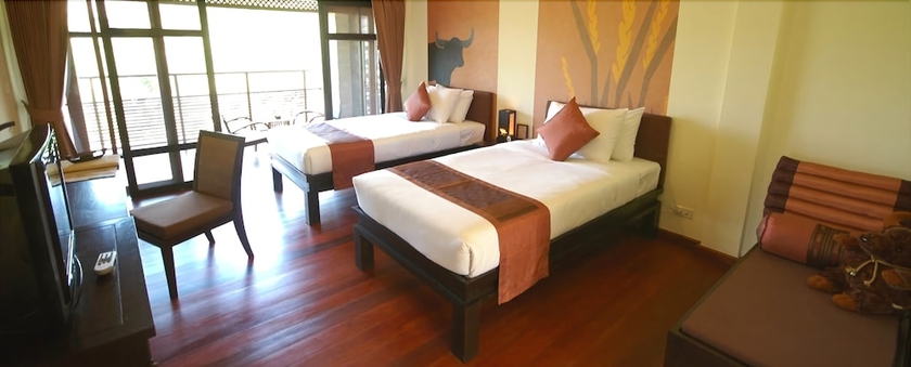 Imagen de la habitación del Hotel Phunacome Resort. Foto 7