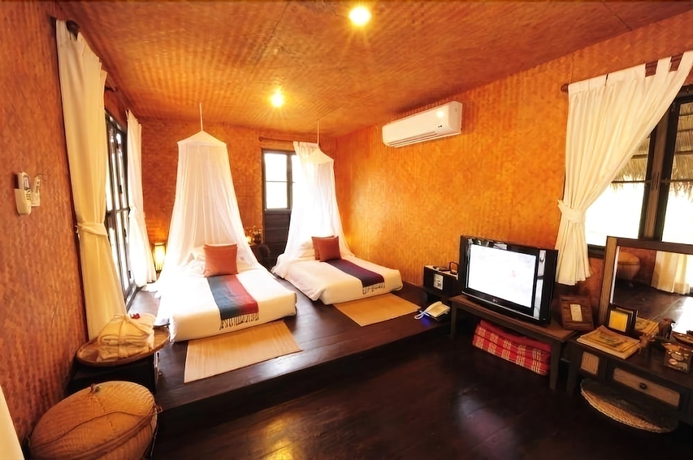 Imagen de la habitación del Hotel Phunacome Resort. Foto 9