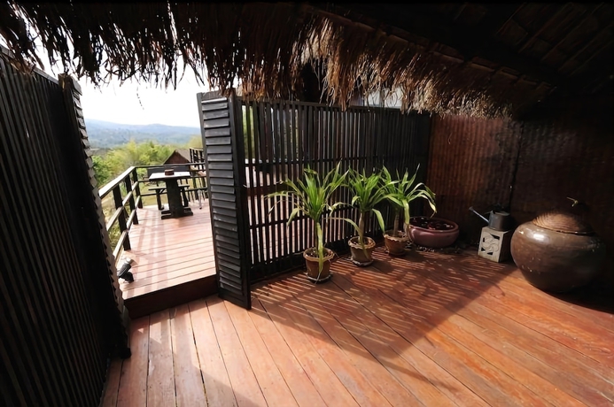 Imagen de la habitación del Hotel Phunacome Resort. Foto 17