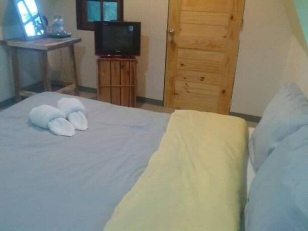 Imagen de la habitación del Hotel Phunaya Resort. Foto 20