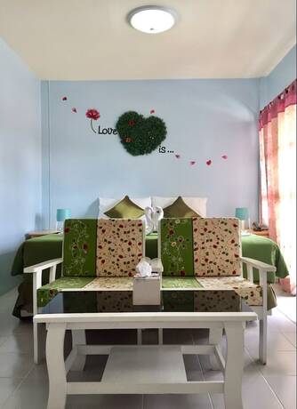 Imagen de la habitación del Hotel Phunyanuch. Foto 18