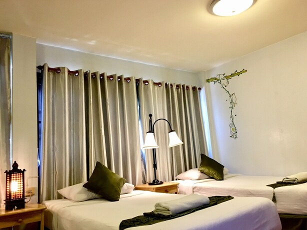 Imagen de la habitación del Hotel Phunyanuch. Foto 20