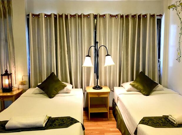 Imagen de la habitación del Hotel Phunyanuch. Foto 23