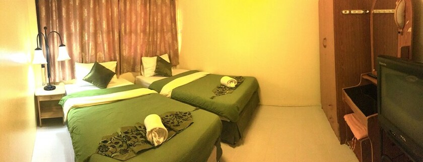Imagen de la habitación del Hotel Phunyanuch. Foto 28