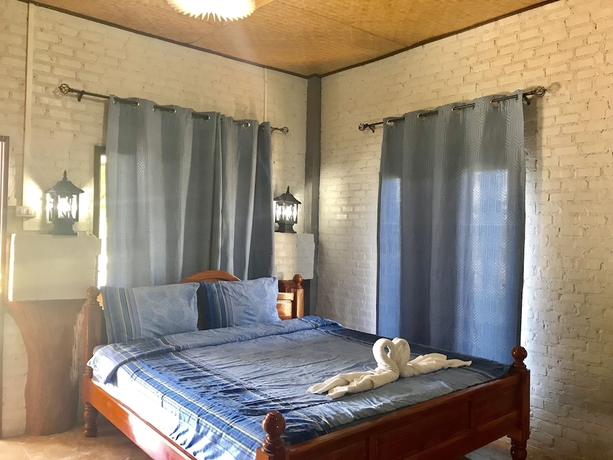 Imagen de la habitación del Hotel Phupha Inn Resort. Foto 9