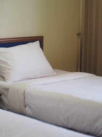 Imagen de la habitación del Hotel Phuphanplace. Foto 11