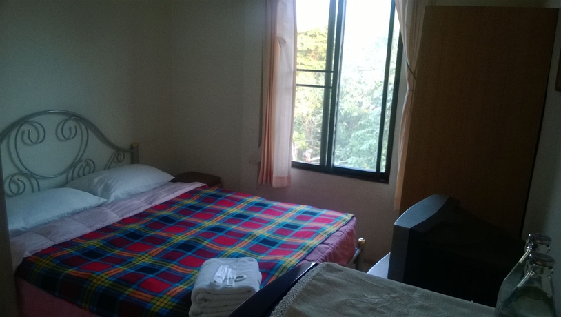 Imagen de la habitación del Hotel Phurahong Homestay. Foto 10