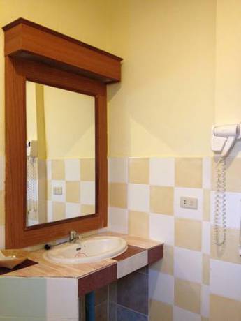 Imagen de la habitación del Hotel Phuwadee Resort and Spa. Foto 16