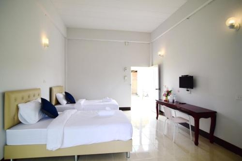 Imagen de la habitación del Hotel Phuwiang Grand Hotel. Foto 10