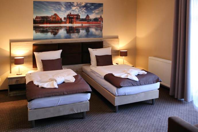 Imagen de la habitación del Hotel Piast, Kałdowo. Foto 11