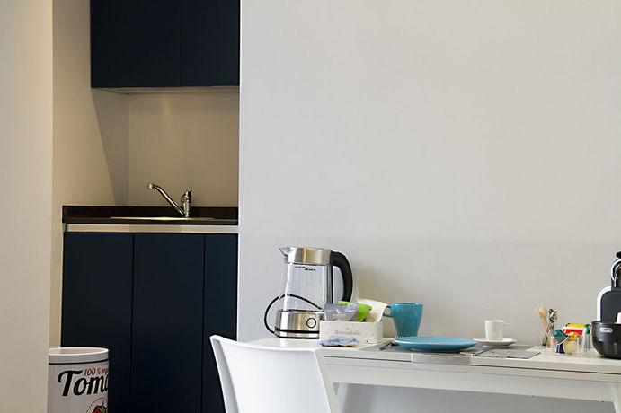 Imagen de la habitación del Hotel Piazza Castello Suite. Foto 6