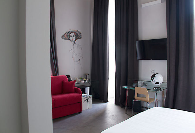 Imagen de la habitación del Hotel Piazza Castello Suite. Foto 8