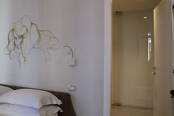 Imagen de la habitación del Hotel Piazza Castello Suite. Foto 10