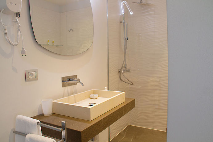 Imagen de la habitación del Hotel Piazza Castello Suite. Foto 13