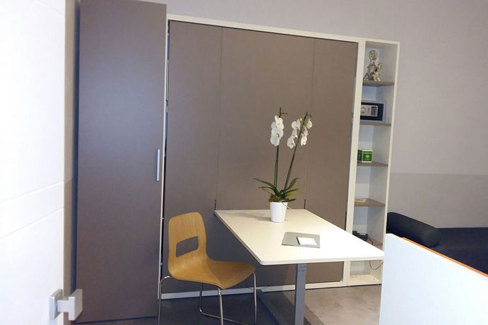 Imagen de la habitación del Hotel Piazza Castello Suite. Foto 14