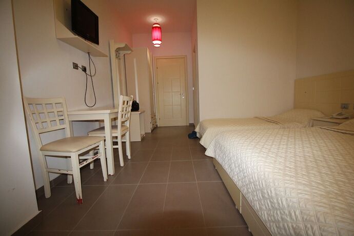 Imagen de la habitación del Hotel Piazza. Foto 11