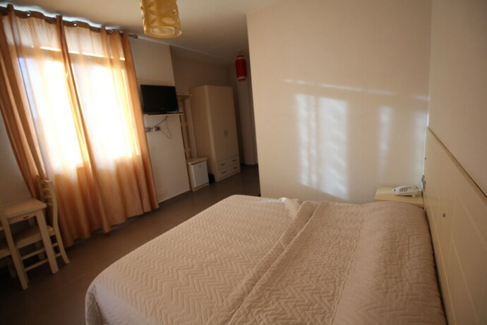 Imagen de la habitación del Hotel Piazza. Foto 15