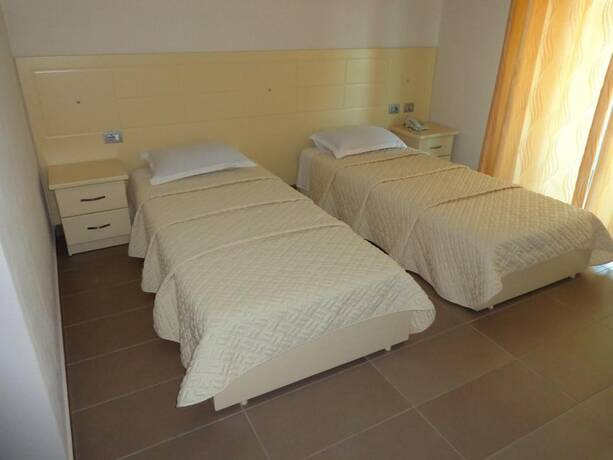 Imagen de la habitación del Hotel Piazza. Foto 17