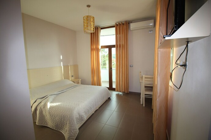 Imagen de la habitación del Hotel Piazza. Foto 18