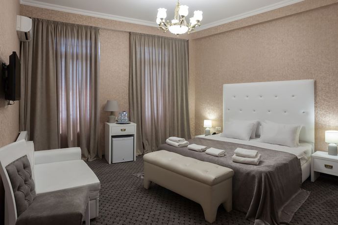 Imagen de la habitación del Hotel Piazza, Tbilisi. Foto 4