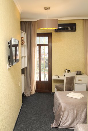 Imagen de la habitación del Hotel Piazza, Tbilisi. Foto 5